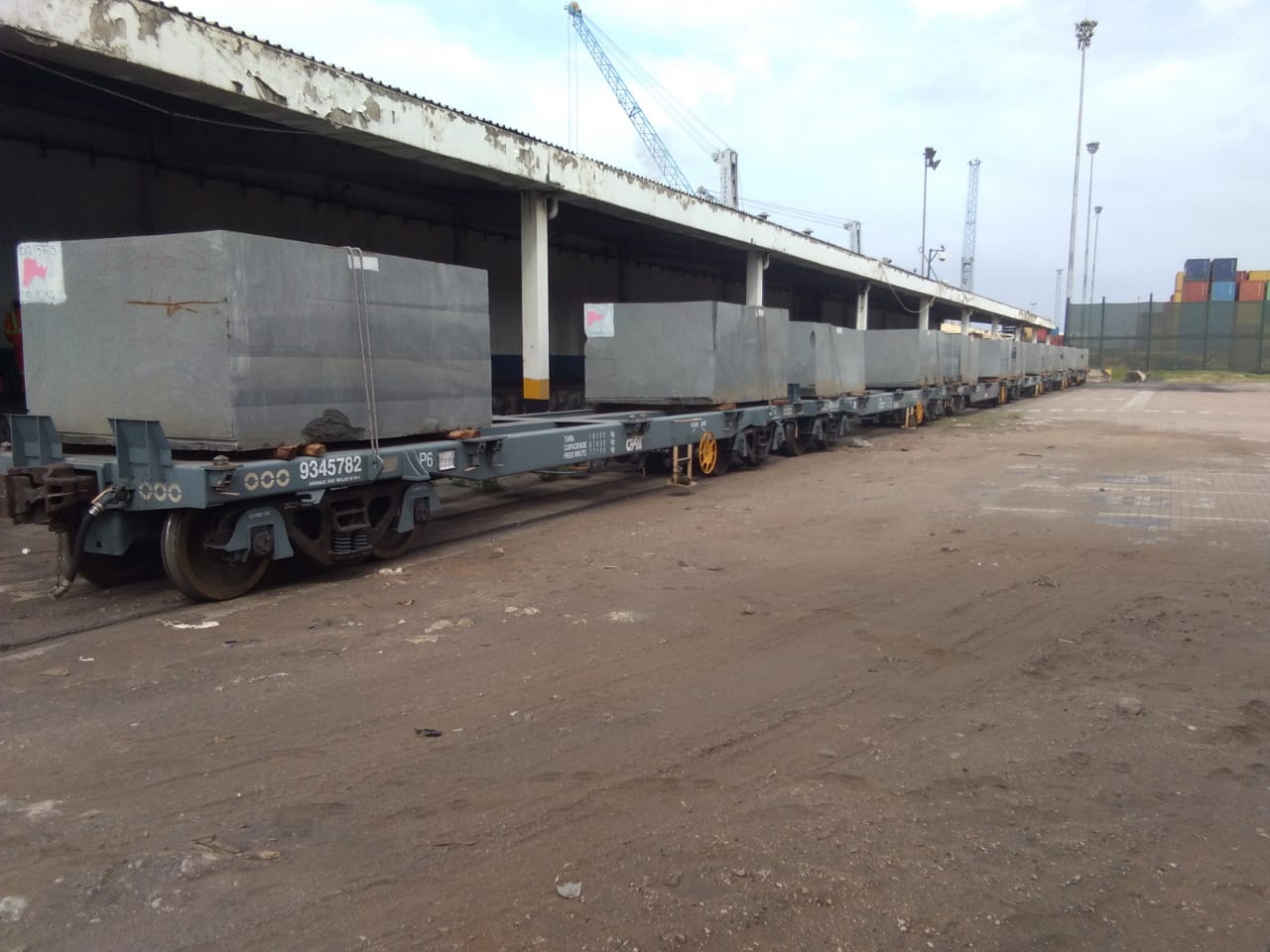 Double-stacked container train in transit